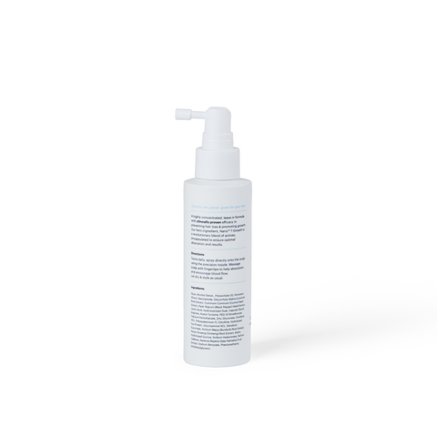 Stïm Haircare Stïmulating Growth Tonïc bottle with applicator tip for promoting hair growth and scalp health.