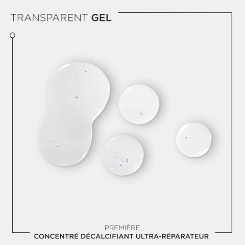 Kérastase Première Decalcifying Ultra-Repairing Pre-Shampoo Treatment bottle, 250ml, with sleek design and labeling visible.