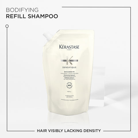 Kérastase Densifique Bain Densité shampoo bottle, 500ml refill, with sleek design and product label visible.