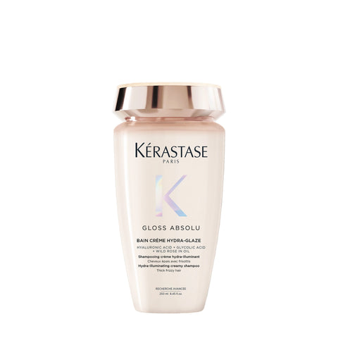 Kérastase Gloss Absolu Bain Crème Hydra-Glaze shampoo bottle, 250mL, with sleek packaging and product label visible.