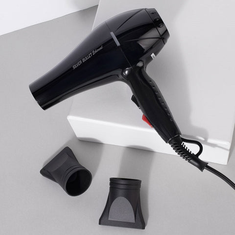 Silver Bullet Ethereal Dryer 2000W hair dryer with sleek silver finish and ergonomic handle, ready for styling.