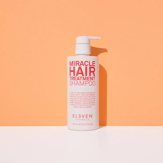 Eleven Australia Miracle Hair Treatment Shampoo 300ml bottle with sleek black and white label and silver cap.