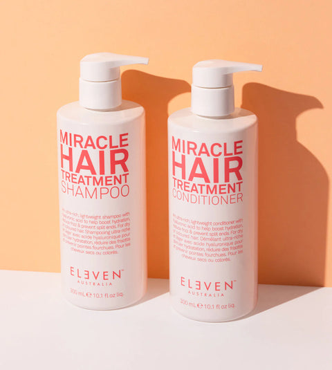 Eleven Australia Miracle Hair Shampoo and Conditioner bundle with sleek bottles, emphasizing nourishing hair treatment.