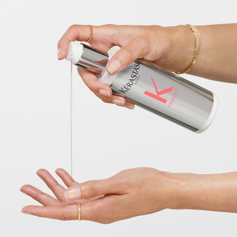 Kérastase Première Decalcifying Ultra-Repairing Pre-Shampoo Treatment bottle, 250ml, with a sleek design and label details.