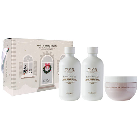 Pure Fusion Complex Christmas Trio box with three skincare products in festive packaging for holiday skincare.