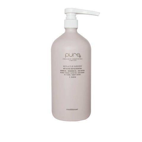 Pure Miracle Renew Conditioner bottle, 1000ml, with sleek white packaging and pump dispenser, designed to nourish and hydrate hair.