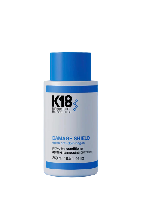 K18 Damage Shield Protective Conditioner 250ml bottle, featuring sleek packaging with the product name and brand logo visible.