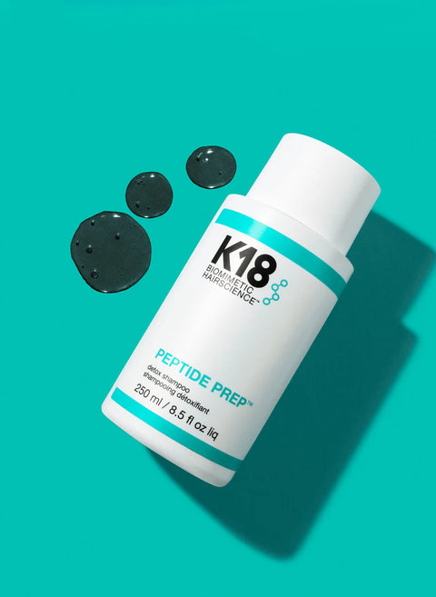 K18 Peptide Prep Detox Shampoo in 250ml bottle with teal textured label, showing the shampoo's packaging and design.