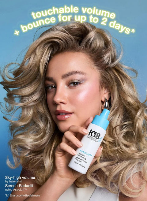K18 AstroLift™ Reparative Volume Spray 118ml on hair, showcasing lightweight styling spray for added volume and repair.