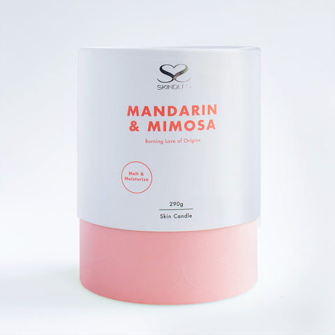 Skindles Mandarin & Mimosa scented candle in 250g glass jar, with a warm, inviting orange and yellow design.