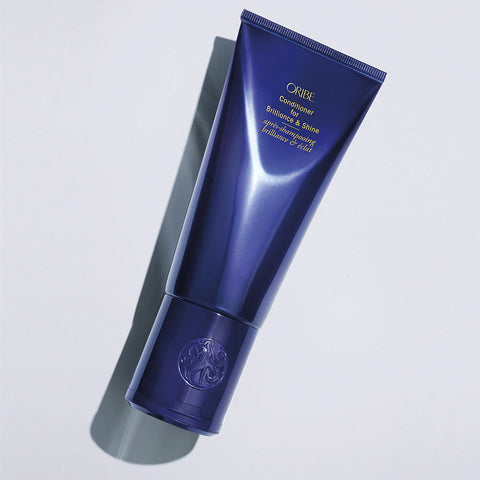 Oribe Supershine Hydrating Conditioner bottle, 200ml, with sleek packaging and product label visible.