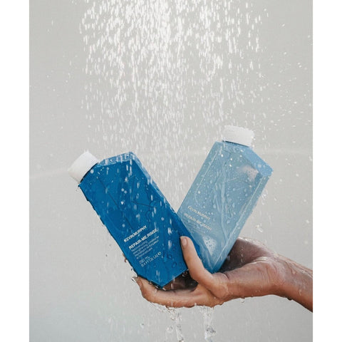 Kevin Murphy Repair Bundle with hair care products, including shampoo and conditioner, in a sleek packaging for damaged hair repair.