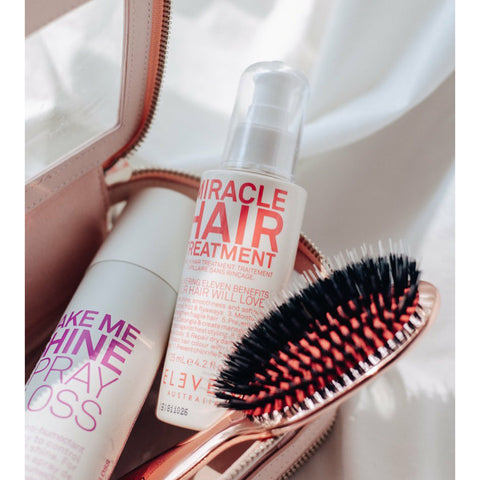 Eleven Australia Miracle Hair Treatment bottle, 125ml, with sleek packaging, designed to nourish and repair damaged hair.