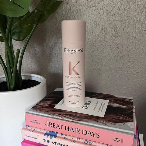 Kérastase Fresh Affair dry shampoo bottle, 150g, with sleek packaging and spray nozzle for refreshing hair between washes.