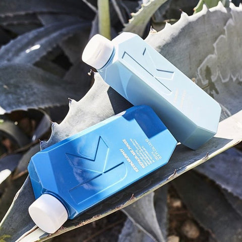 Kevin Murphy Repair Bundle including hair care products, bottles with sleek packaging, designed for damaged hair treatment.