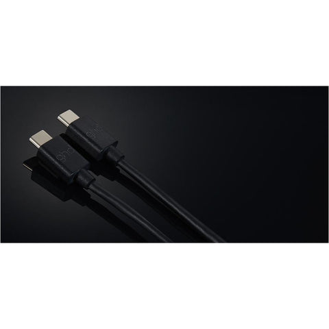 GHD Unplugged Black straightener with sleek design and ceramic plates for smooth, professional hair styling.
