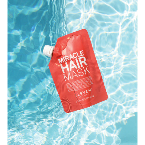 Eleven Australia Miracle Hair Mask 200ml treatment jar with a sleek black and gold label, designed for nourishing hair.