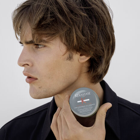 Kérastase Genesis Homme thickening clay styling paste for men, 75ml, with textured appearance and matte finish.