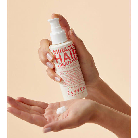 Bottle of Eleven Australia Miracle Hair Treatment 125ml with sleek packaging, designed to nourish and repair hair.