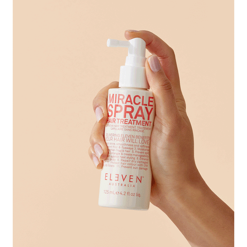 Eleven Australia Miracle Spray Hair Treatment in 125ml bottle, showing the spray bottle with a sleek design and product label.