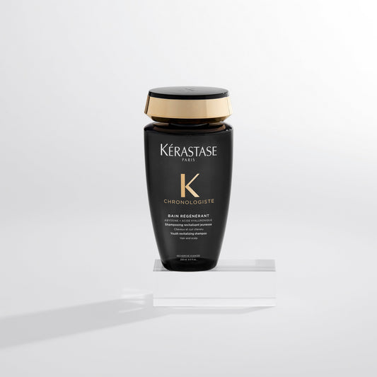 Kérastase Chronologiste bundle with luxurious shampoo and hair care products in elegant packaging.