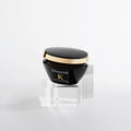 Kérastase Chronologiste bundle with a jar of Chrono Masque and hair care products for revitalizing hair and scalp.