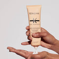 Kérastase Curl Manifesto bundle featuring a curl cream in a sleek jar for defining and nourishing curly hair.