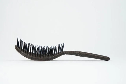 EcoHeads Wet Detangling Brush showing flexible bristles, designed for gentle detangling on wet hair.