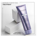 Kérastase Blond Absolu Duo bundle with hair care products for blond hair, featuring sleek bottles and elegant packaging.