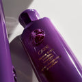 Oribe Serene Scalp Densifying Conditioner bottle with sleek design and product label, 175ml size, on a neutral background.