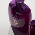 Oribe Serene Scalp Densifying Shampoo bottle, 250ml, with sleek design and label, shown in this product image.