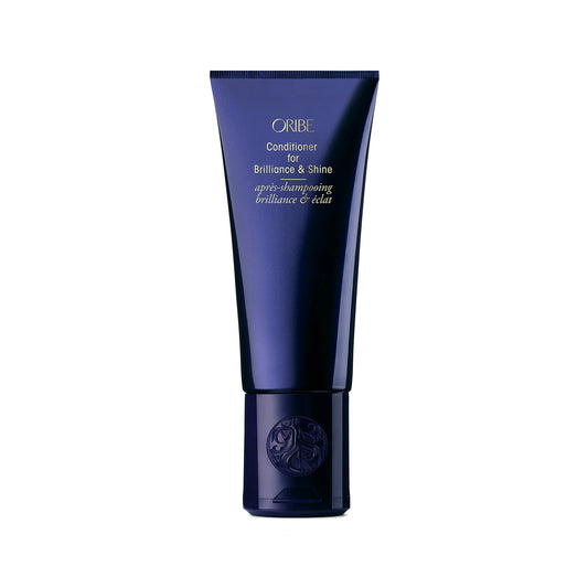 Oribe Conditioner for Brilliance & Shine bottle with sleek design, showing the luxurious hair conditioner for added shine and smoothness.